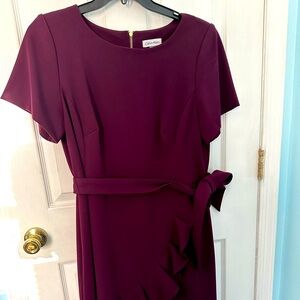 Calvin Kline dress size 14W.  Maroon color.  I only wore it once to a wedding.
